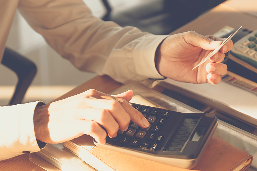 Man using calculators