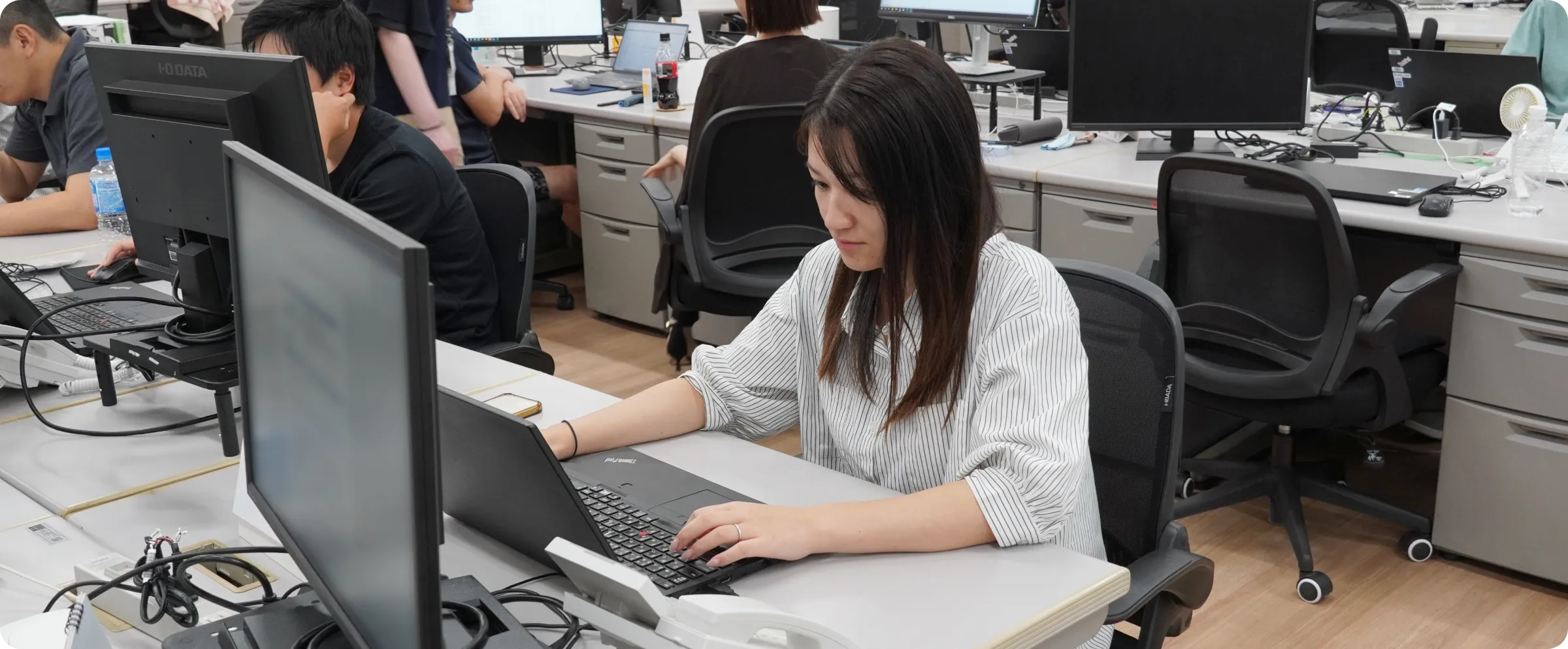 経営戦略（M&A）の社員の業務風景